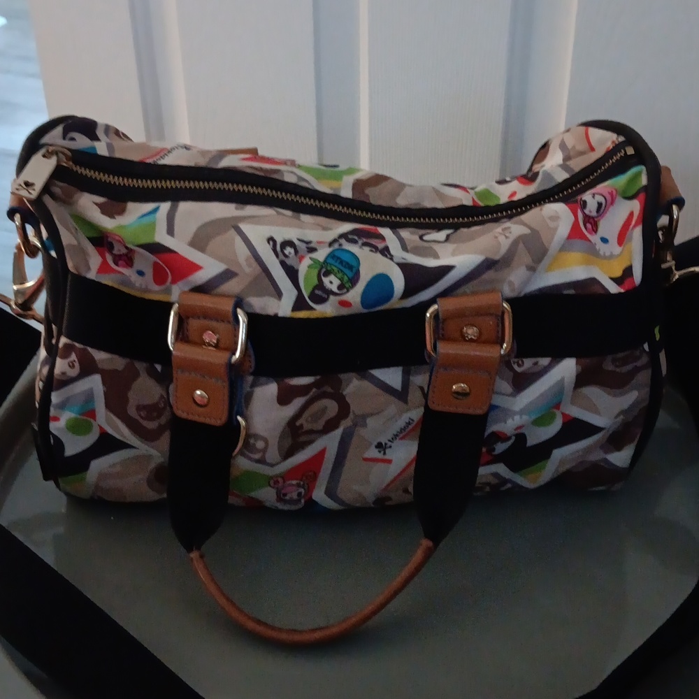TOKIDOKI  satchel cross body bag Gently used  condition price firm now